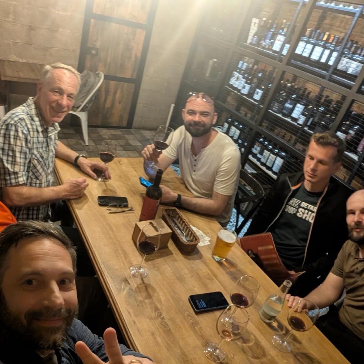 Five members around the table at a wine cellar, 11 May 2026