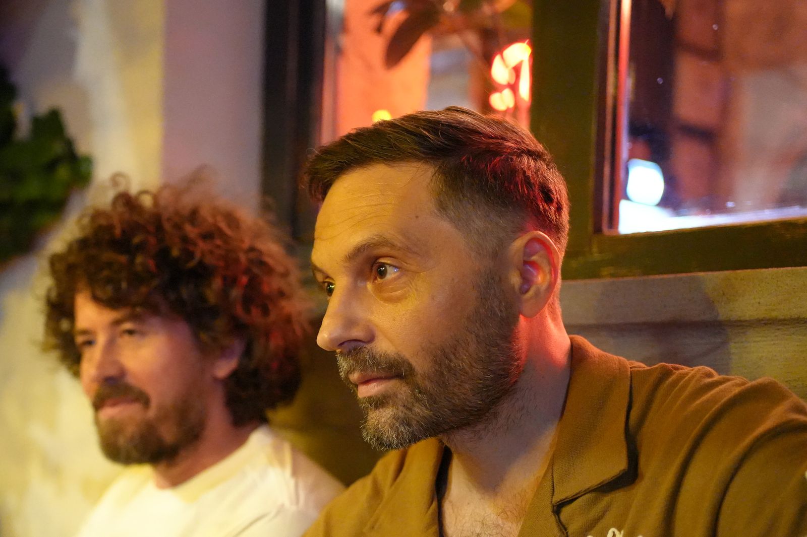 Two of the boys, in profile, warm night light