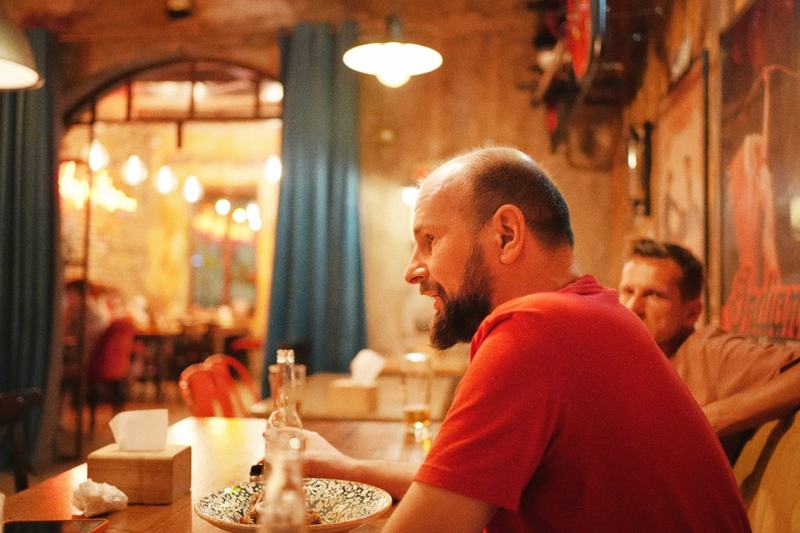 A frame from the night at the table · Sony a7C II · FE 35mm F1.8