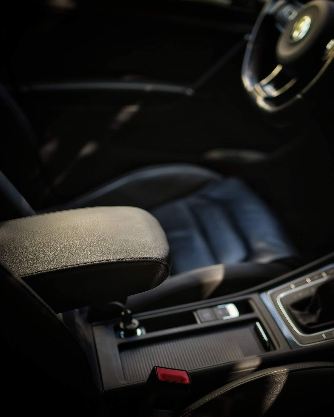 The e-Golf armrest raised on its hinge