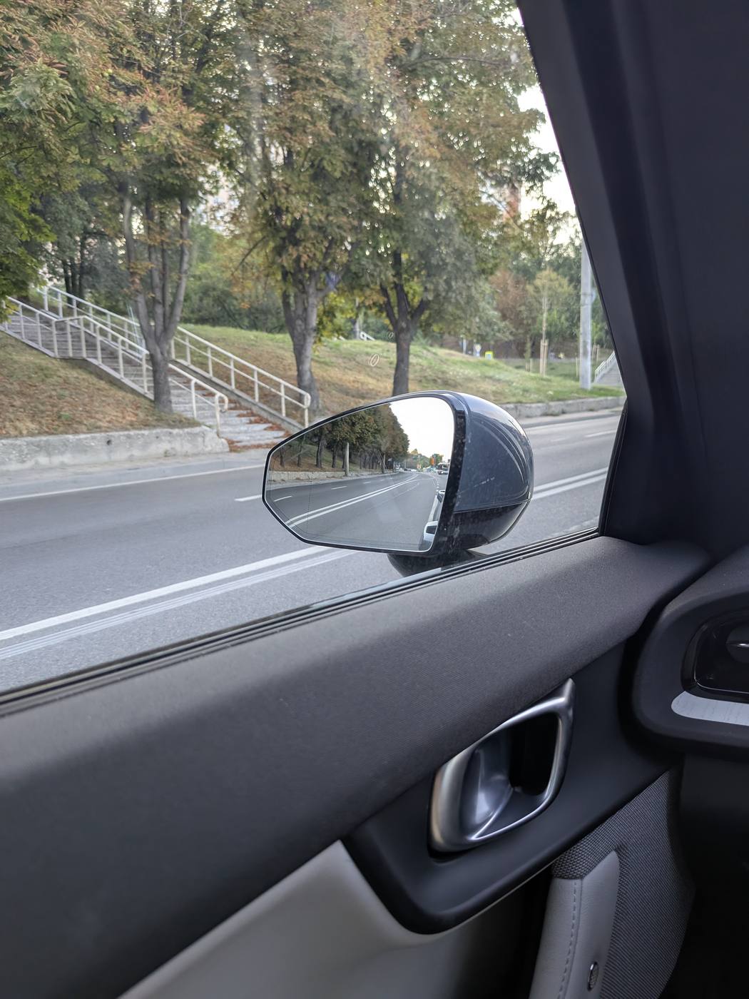 The driver's mirror with the European glass fitted, seen from inside