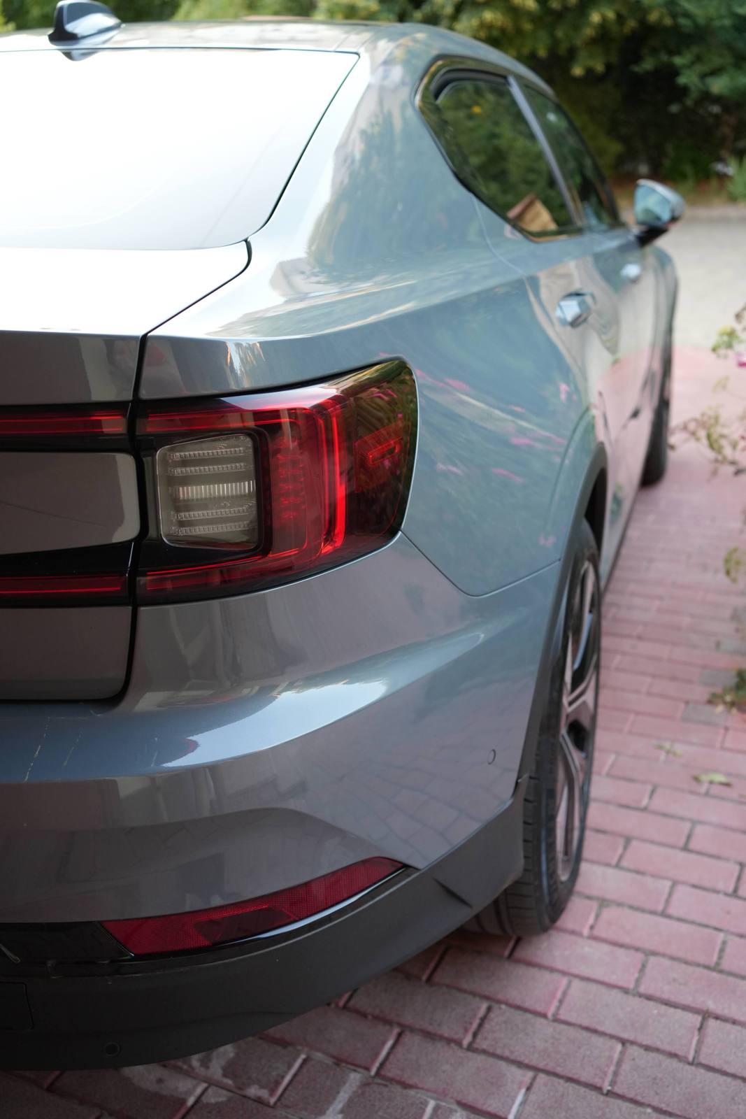 Rear three-quarter: the fastback tailgate and steel body
